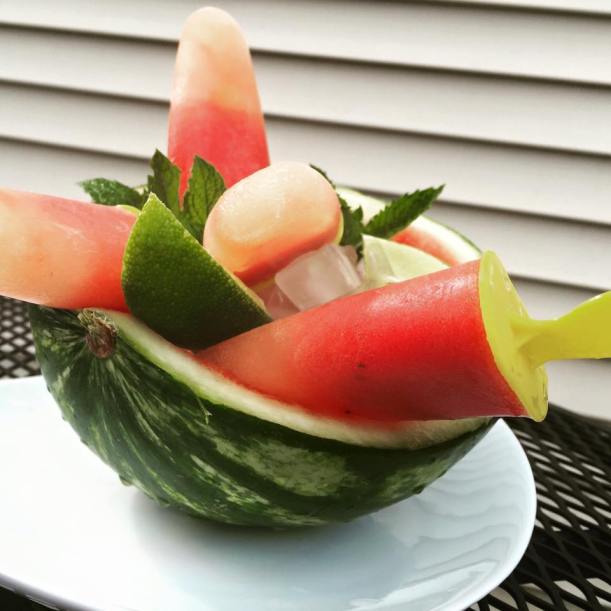Watermelon popsicles with a hint of lime and mint.